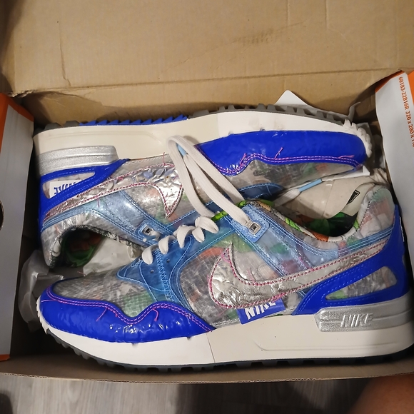 Nike Shoes - Nike Metallic Silver and Blue Sneakers